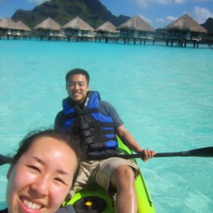 Kayaking on the open water by the over water bungalows in Le Méridien.